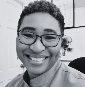 A photo of Dr Sylvia Kama-Kieghe in black and white